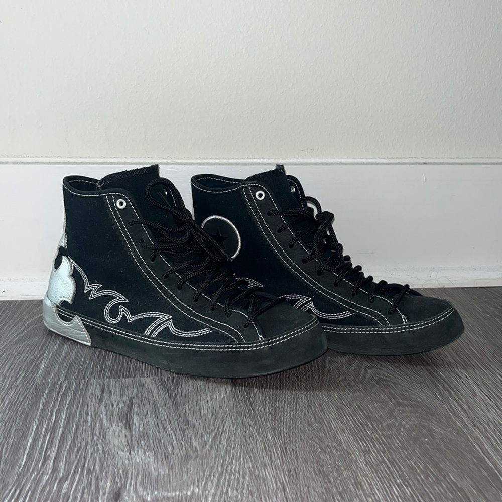 black converse with silver flame design
